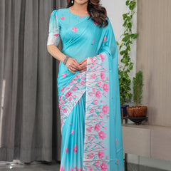 Aqua Blue Satin Georgette Pink Floral Printed Saree with Attached Blouse – Soft Pastel Designer Saree for Elegant & Festive Wear