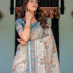 Icy Blue Handloom Cotton Saree with Peach Elephant Motifs & Royal Procession Pallu