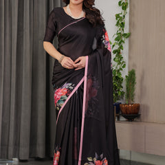 Black Satin Georgette Floral Printed Saree with Soft Pink Border & Attached Blouse – Elegant Designer Partywear Drape