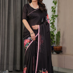 Black Satin Georgette Floral Printed Saree with Soft Pink Border & Attached Blouse – Elegant Designer Partywear Drape