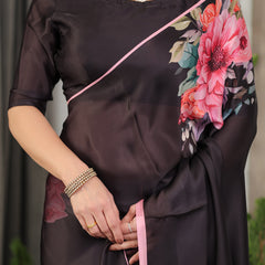 Black Satin Georgette Floral Printed Saree with Soft Pink Border & Attached Blouse – Elegant Designer Partywear Drape