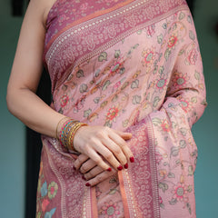 Blush Pink Handloom Cotton-Linen Saree with Floral Motifs and Artistic Pallu