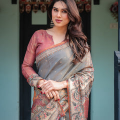 Slate Blue Handloom Cotton-Linen Saree with Vibrant Folk Motifs and Floral Pallu