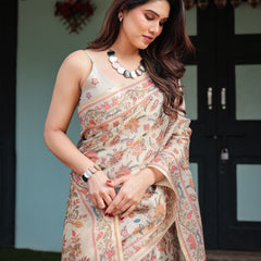 Elegant Beige Handloom Cotton-Linen Saree with Golden Zari Weave, Floral Printed Pallu & Tassel Detailing