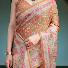 Warm Gold Pure Linen Cotton Handloom Printed Saree with Floral and Figurative Patterns, Golden Zari Weave, Tassels, and Slub Texture