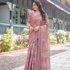 Regal Pink Handloom Cotton-Linen Saree with Floral Motifs, Golden Zari Highlights, and Tassel Detailing