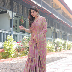 Regal Pink Handloom Cotton-Linen Saree with Floral Motifs, Golden Zari Highlights, and Tassel Detailing