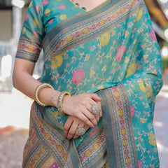 Sea Green Handloom Cotton Saree with Multicolor Floral & Royal Procession Pallu