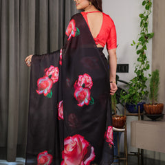 Black Satin Georgette Rose Printed Saree with Attached Blouse – Elegant Partywear Designer Saree with Red Floral Artwork
