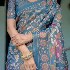 Dusty Blue Handloom Cotton Saree with Floral Print & Pink Cow Lotus Motif Pallu