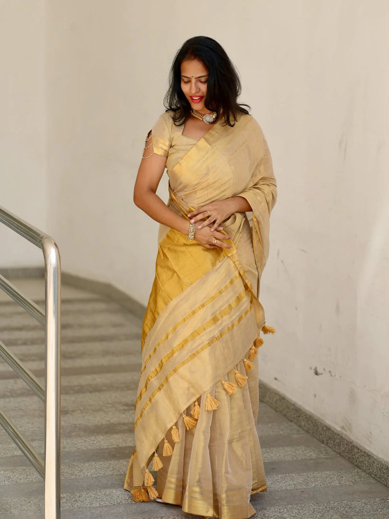 Luxury Off White Gold Kasavu Saree with Designer Tassel Pallu